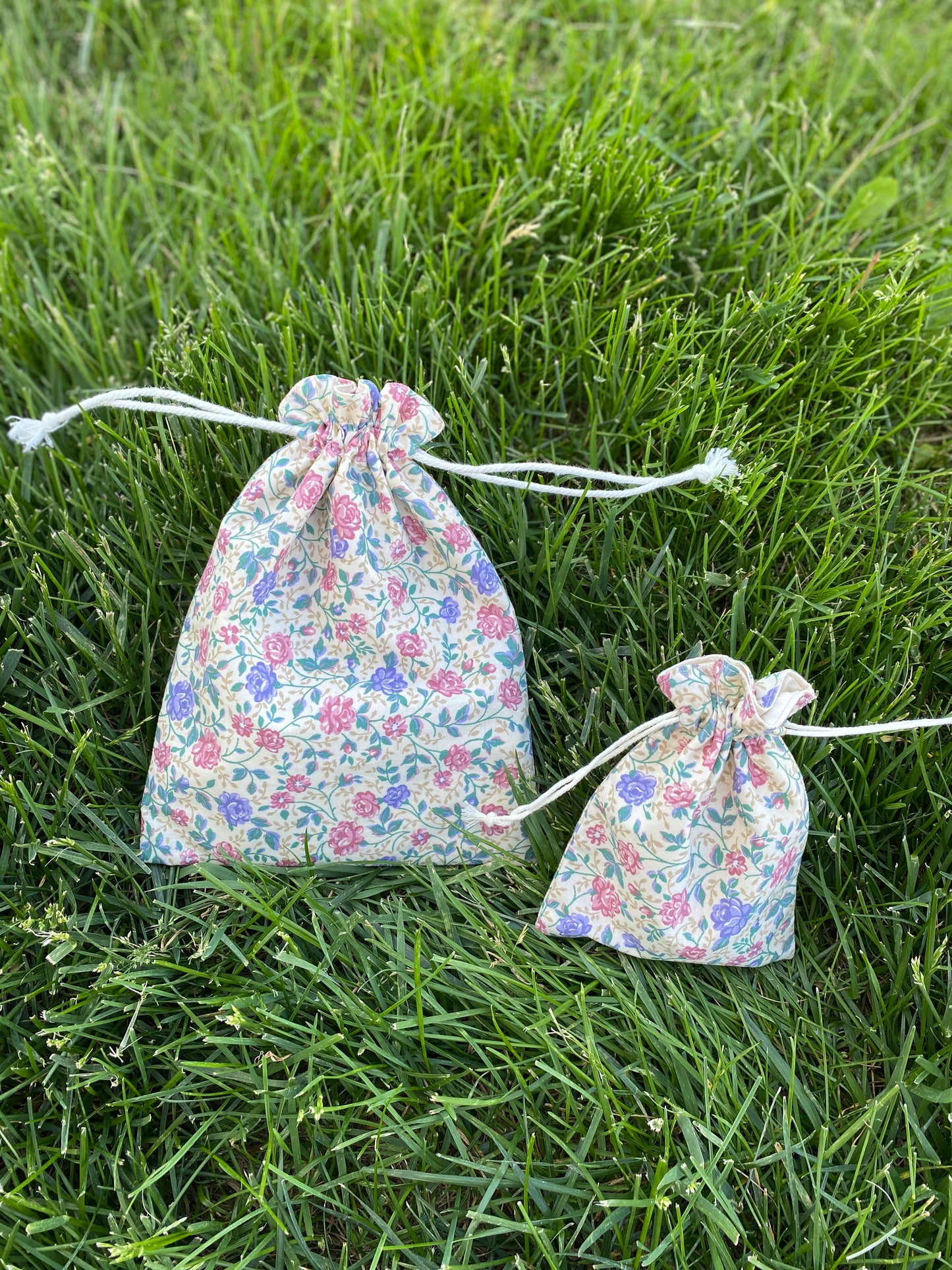 Rose on Cream Drawstring Bags
