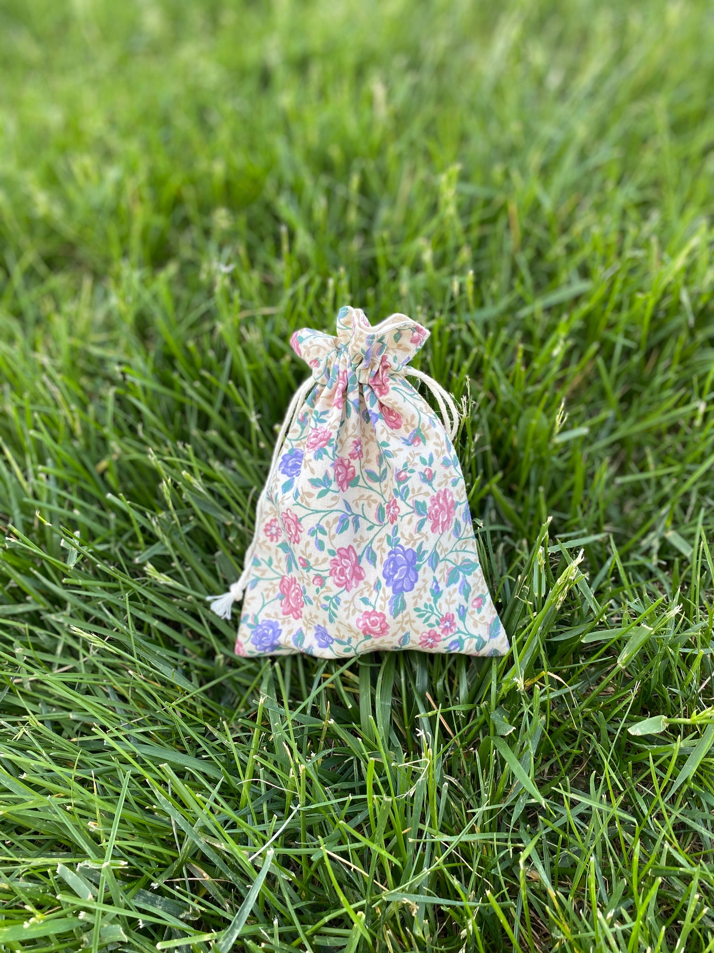 Rose on Cream Drawstring Bags