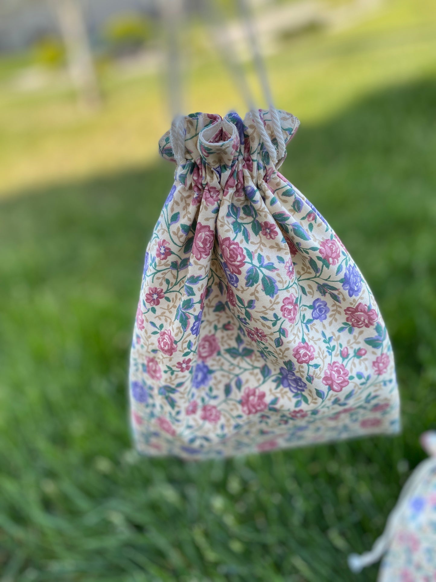 Rose on Cream Drawstring Bags