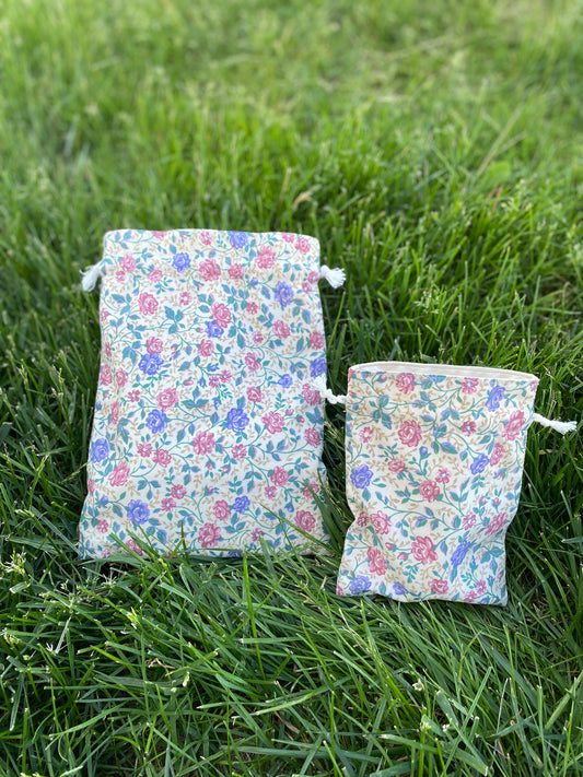 Rose on Cream Drawstring Bags
