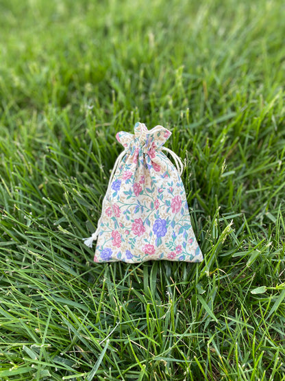 Rose on Cream Drawstring Bags