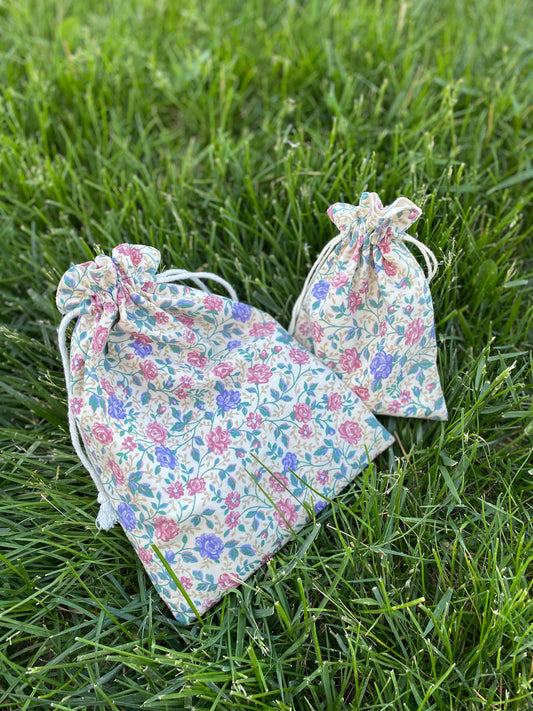 Rose on Cream Drawstring Bags